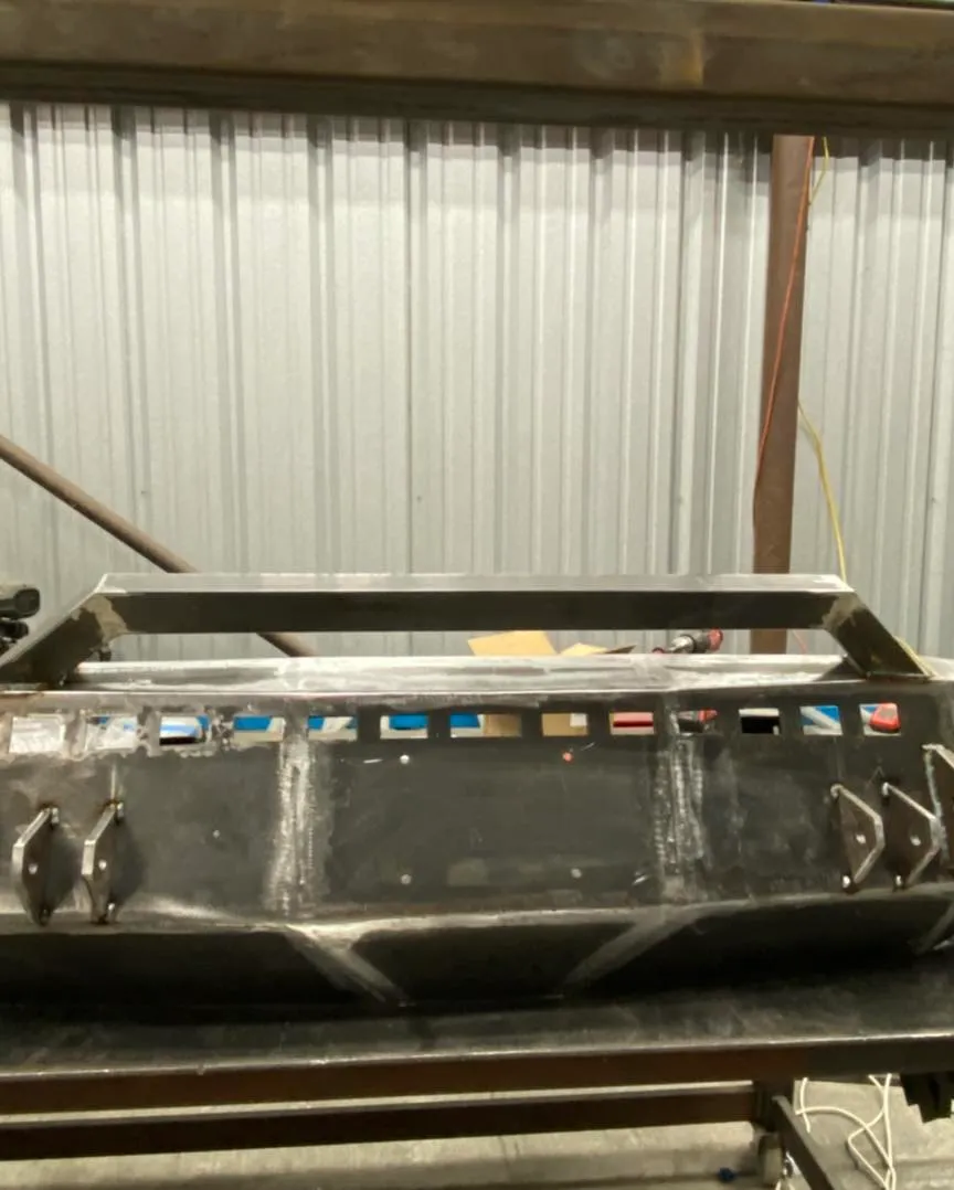 Precision metal fabrication work showing detailed welding craftsmanship