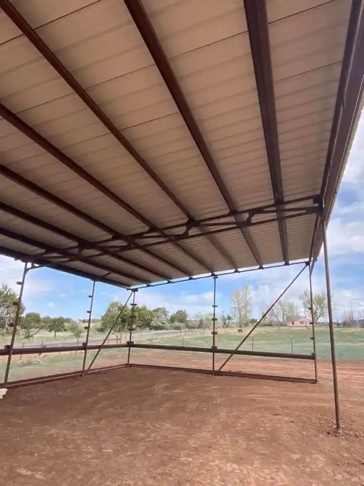 Detailed underside view of metal roof structure showing construction quality